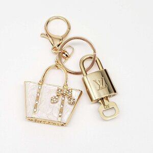 100% Auth Louis Vuitton Lock & Key with unbranded Bagcharm, Keycharm, Keychain